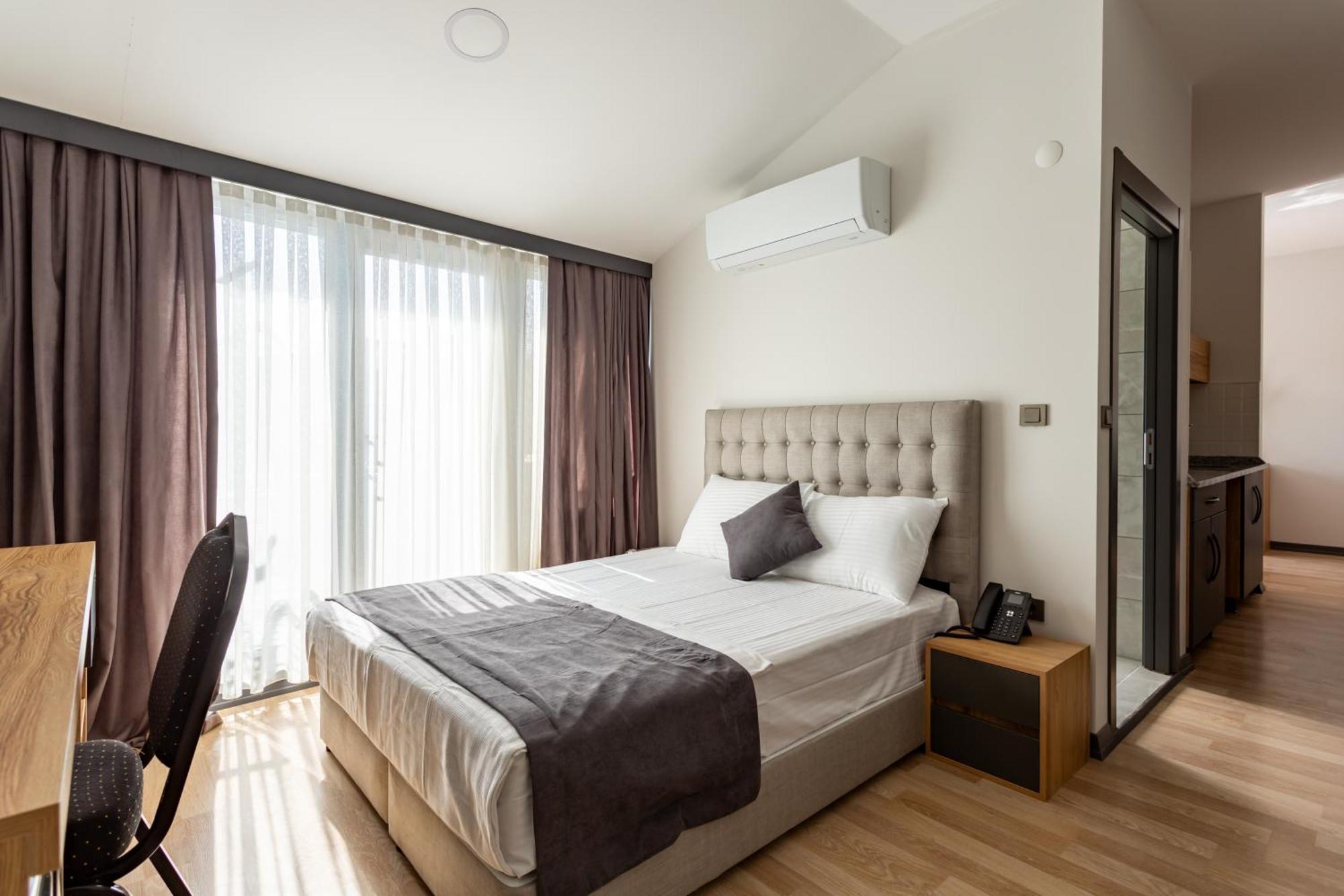 Atm Suit Otel Истанбул Екстериор снимка